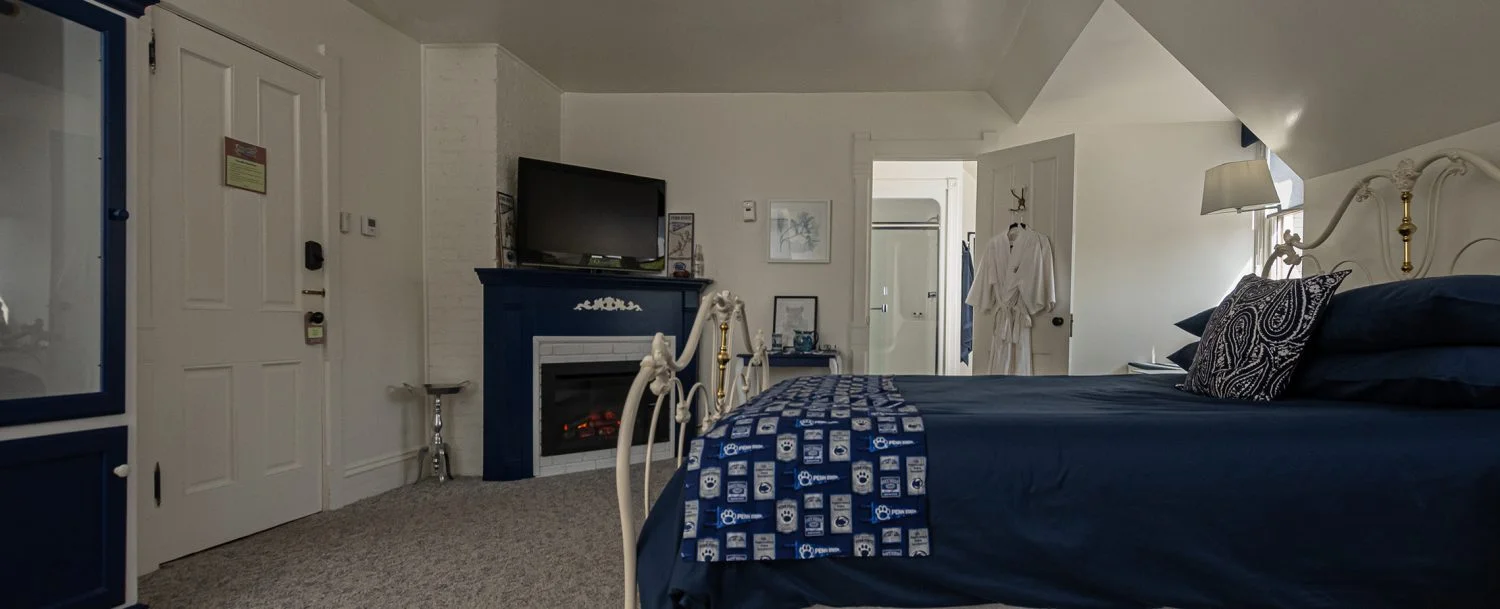 Nittany Blue Room Bed and Fireplace