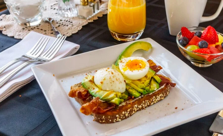 breakfast food, avocado toast with fruits and orange juice